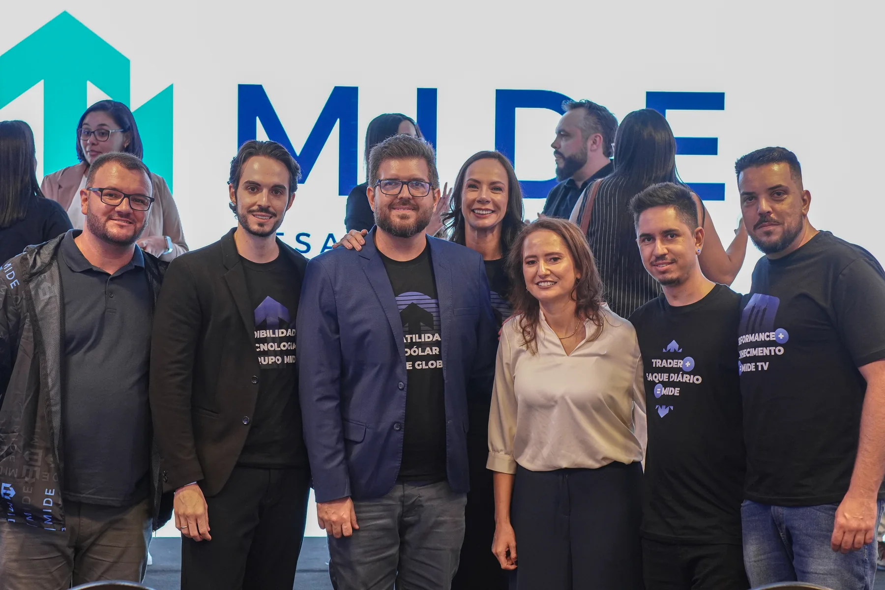 Equipe reunida em um encontro presencial da MIDE